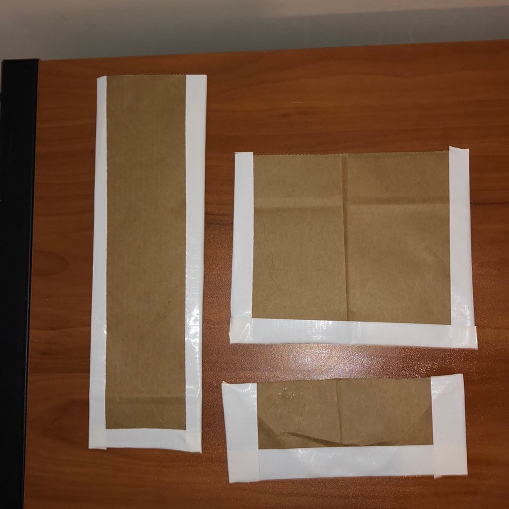 3 multi sized brown bags.